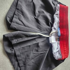 Black Swim Shorts with Red Elastic Waistband